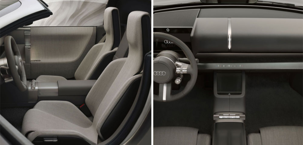 Audi Concept C interior featuring minimalist two-seat layout, foldable center display, and haptic controls.