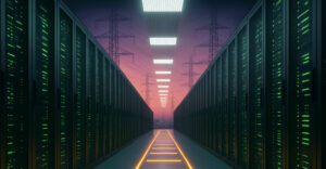 Wide-angle view of a modern data center aisle with glowing green server racks and illuminated floor panels, blending into a backdrop of towering electrical transmission towers against a colorful twilight sky.